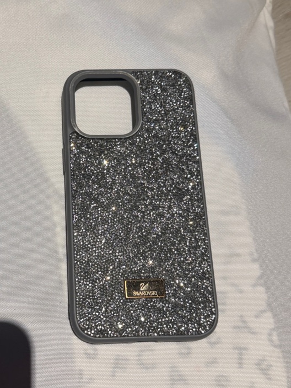 Swarovski 14 pro max Silver Glitter Crystal iPhone Case with Branded Plaque